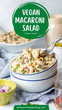 vegan macaroni salad in a white bowl with a green label over the top