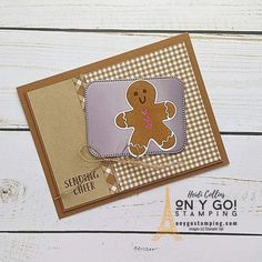 a close up of a card with a ginger on it and the words sending cheer