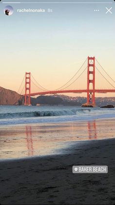 the golden gate bridge in san francisco, california is reflected in the water at sunset