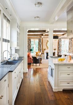 the kitchen is clean and ready to be used as a living room or dining area