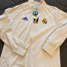 White Real Madrid Jacket! Real Madrid Clothes, Adidas White Outerwear For Spring, White Adidas Outerwear With Pockets, White Adidas Outerwear For Spring, Adidas White Outerwear For Fall, White Adidas Outerwear For Fall, Real Madrid Jacket, Ronaldo Real Madrid, Adidas Supernova