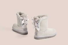 Bailey Bow II Boot | UGG® Official Boots With Bows, Slippers Ugg, Ugg Boots Sale, Ugg Store, Quilted Boots, Everyday Boots, Boots Slippers, Buy Boots, Shoes Free