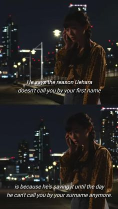 a man talking on a cell phone in front of a city at night