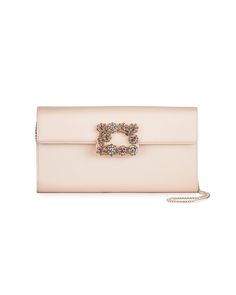 Roger Vivier clutch bag in silk satin with crystal-embellished flower buckle ornament. Removable chain shoulder strap. Flap top with snap closure. Divided interior. 9.4"L. Made in Italy. | Roger Vivier Envelope Flap Flower Buckle Clutch Bag Roger Vivier Bag, Roger Vivier Clutch, Purse Aesthetic, Lady Dior Handbag, Roger Vivier Shoes, Expensive Bag, Luxury Bags Collection, Latest Handbags, Buckle Top