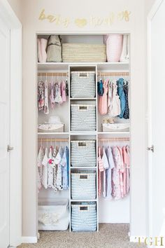 an organized closet with clothes and baskets