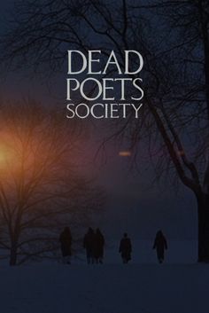 people walking in the snow at night under a street light with the words dead poets society on it