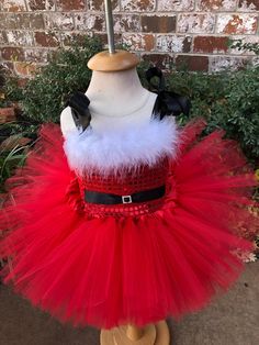 Sequin sparkle Santa style top with matching buckle bow . Lush fur line top and layers of tulle make the perfect holiday dress for any event. Cute Christmas Tutu Dress With Ruffles, Christmas Tutu Dress With Ruffles, Red Christmas Tutu Dress, Red Tutu Dress For Holiday Dress-up, Red Christmas Tutu Dress For Dress-up, Girls Christmas Dress, Umbrella Photo, Christmas Tutu, Purple Tutu