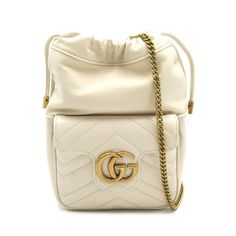 GUCCI GG Marmont Shoulder Bag  Brand: Gucci    Model: GG Marmont    Color: White    Material: Leather    Comes with: Box, Dust bag    Dimensions: 21cm x 13.5cm x 6.5cm    Serial number: 746433.0416    Country of origin: Italie      This item has been used and may have some minor flaws. Before purchasing, please refer to the images for the exact condition of the item.   A return request must be submitted within 48 hours after delivery. Customer is responsible for return shipping costs and fees. Estimated return shipping costs for this item are $80. Contact Our Customer Support for details.  This item ships internationally and will ship out within 3-5 business days.  We cannot confirm the time period listed. Gg Marmont Mini Bucket Bag, Gucci Gg Marmont Mini, Gg Marmont Mini, Gucci Mini, Hardware Logo, Luxurious Fashion, Mini Bucket Bags, Mini Bucket, Gucci Gg Marmont