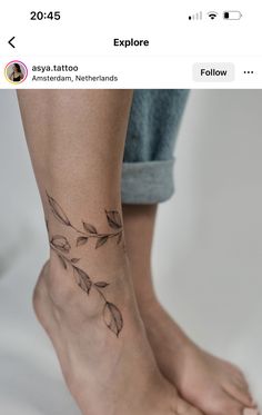 a woman's foot with a tattoo on it