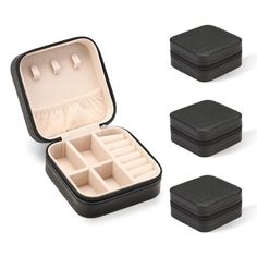 four pieces of black jewelry case with dividers