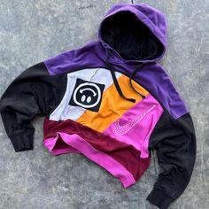 Vintage Reworked Custom Nike "Upside Down"Crop Hoodie Crewneck Sweatshirt   Size Medium  Measures 22"x22" length  Great Shape Overall  1/1 custom piece  Any questions feel free to reach out! IG @ jaded.coast Hooded Patchwork Sweatshirt For Streetwear, Urban Patchwork Hoodie For Streetwear, Multicolor Patchwork Sweatshirt For Streetwear, Purple Sportswear Hoodie For Streetwear, Urban Sweatshirt With Patchwork For Streetwear, Urban Patchwork Sweatshirt For Streetwear, Urban Patchwork Sweatshirt, Multicolor Patchwork Hoodie For Streetwear, Vintage Reworked Clothing