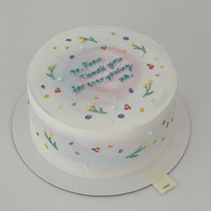 a birthday cake with the words happy birthday on it's frosted icing