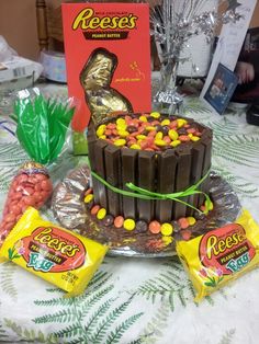 there is a cake with candy on the table