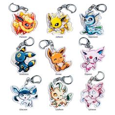 the pokemon keychains are all different colors and sizes, with various designs on them