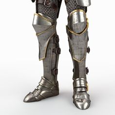 the legs and feet of a man in armor