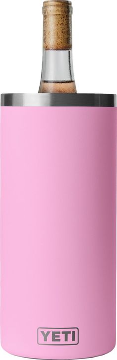 a pink yeti flask with a cork top