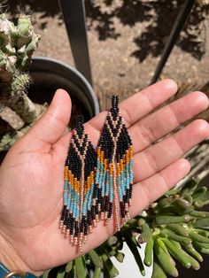 Chevron earrings, fringe earrings, beaded earrings measuring at 1 inch wide, 3 inches long. Chevron Earrings, Chino Hills, Seed Bead Patterns, Dusters, Earrings Beaded, Bead Patterns, Fringe Earrings, Bead Earrings, Chandelier Earrings