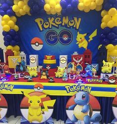 a pokemon themed birthday party with balloons and decorations