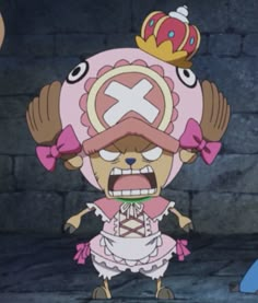 an animated character with a crown on top of his head and hands in front of him