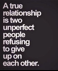 a black and white photo with the words, a true relationship is two imperfect perfect people refuse to give up on each other