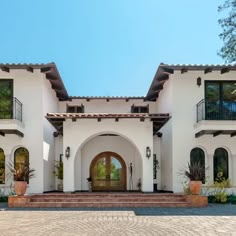 a large white house with lots of windows