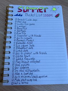 a notebook with the words summer bucket list on it