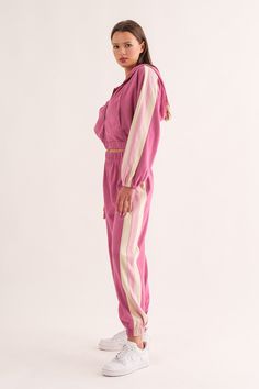 Colorful Sides Sweat Set • Raspberry Get set to wear for all your on the go days. Cropped zip top and matching sweat pants. Sporty Pink Sweats For Spring, Pink Athleisure Joggers With Drawstring, Pink Sportswear Sweatpants For Leisure, Pink Leisure Sweatpants Sportswear, Pink Sportswear Tracksuit, Sporty Relaxed Fit Track Jacket For Loungewear, Leisure Athleisure Activewear With Drawstring Hood, Pink Athleisure Sweats For Leisure, Pink Cotton Tracksuit For Leisure