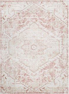 an old rug with faded pink and white colors