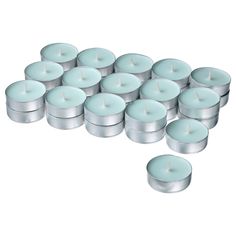 twelve tealight candles in tins with white wax on the top and one light blue