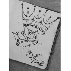 a drawing of a crown with the words queen and king on it's side