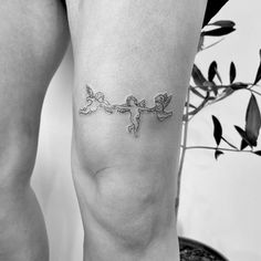 a person with a tattoo on their leg