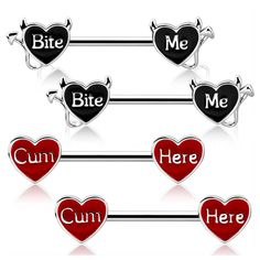 four heart shaped charms with the word cum here and me in different languages on them