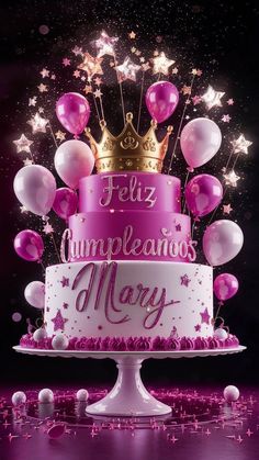 a birthday cake with balloons and confetti in the shape of a crown on top that reads feliz cumpleanos mary