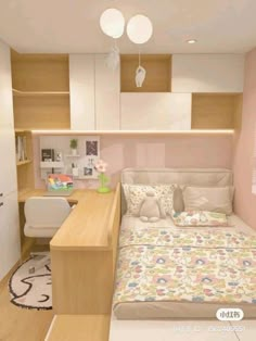 a bedroom with a bed and desk in it