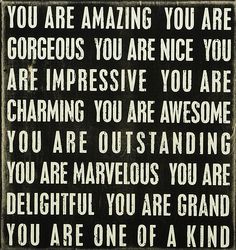 a sign that says you are amazing and the words on it say, you are amazing