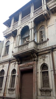 an old building with ornate balconies and windows