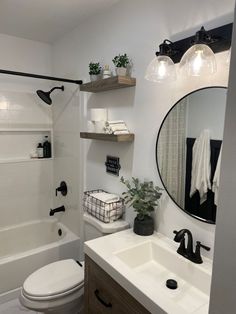 a bathroom with a sink, toilet and bathtub