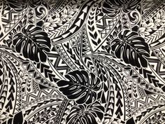 an artistic black and white pattern with leaves on the side, as well as other designs