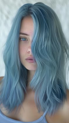 26 Blue Hair Inspirations for Bold Beauties Blue Eyes Blue Hair, Pale Blue Hair Color, Muted Blue Hair, Different Shades Of Blue Hair Color, Muted Blue Hair Color, Light Blue And Dark Blue Hair, Fog Blue Hair, Faded Blue Hair, Ice Blue Hair