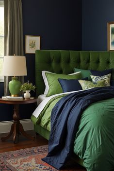 a bedroom with blue walls and green bedding