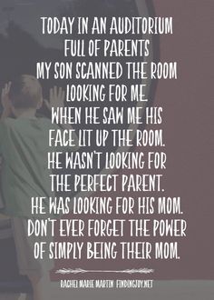 a person standing in front of a mirror with the words today in an auditorium full of parents