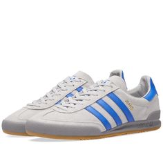 Add a retro vibe to your look with these men's Jeans trainers from adidas Originals. Made from smooth leather for premium support, they feature a tonal lace up fastening and a gum rubber sole for a vintage-look. In a grey colourway with Blue overlays, these sneakers are finished with serrated 3-Stripes to the sidewalls, a golden 'Jeans' wordmark and signature Trefoil branding. Care & Material Leather & Textile Upper/Synthetic Sole Colour: Grey/Blue Code: CQ2769 Adidas Originals Jeans, Blue Code, Grey Adidas, Shoes With Jeans, Retro Vibe, Grey Blue, Blue Leather, Smooth Leather