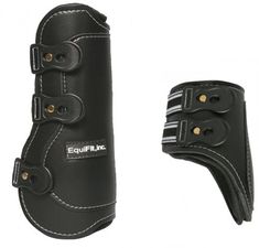 a pair of black equestrian boots with white stitching