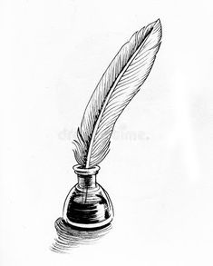 an ink pen with a feather quill on it