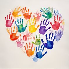 a heart made out of handprints on a white background