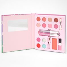 You'll love this holographic makeup set decorated with an ombre, unicorn design! There's even a mirror inside for touchups on-the-go. Included: 8 eyeshadows, 4 lip glosses, 2 glitter mascaras, 3 applicators, 1 blush, 1 mirror Dimensions: 6.5" W x 7" H x 1" D Materials: Powder/Cream - Claire's Holographic Unicorn Makeup Set - Pink Kid Makeup, Peanuts Decor, Justice Makeup, Claire's Makeup, Glitter Mascara, Holographic Makeup, Makeup Starter Kit, Makeup Kit For Kids, Makeup Kits