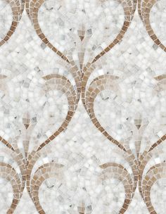 a white and brown mosaic tile wallpaper with an intricate design in the center,