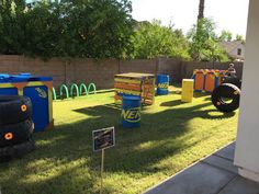 there are many toys in the yard on display