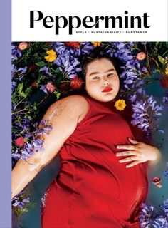 the cover of peppermint magazine featuring a pregnant woman in a red dress surrounded by flowers