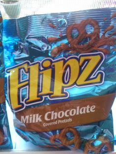 two bags of flipz milk chocolate covered pretzels